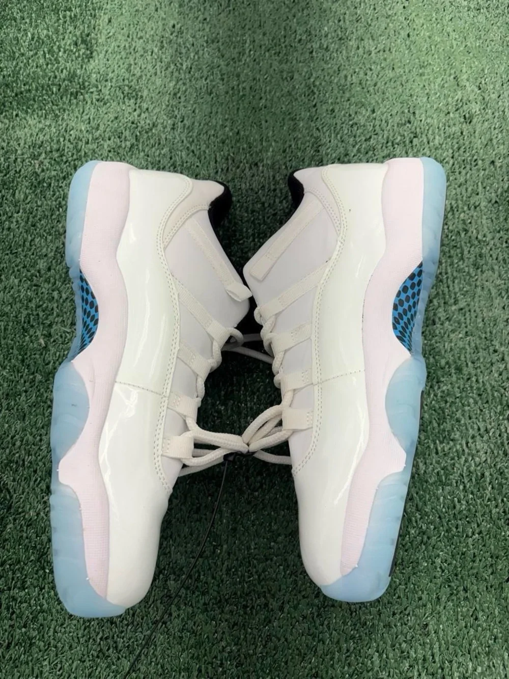 Jordan Men's White Athletic Shoes with Black Interior and Light Blue Accents